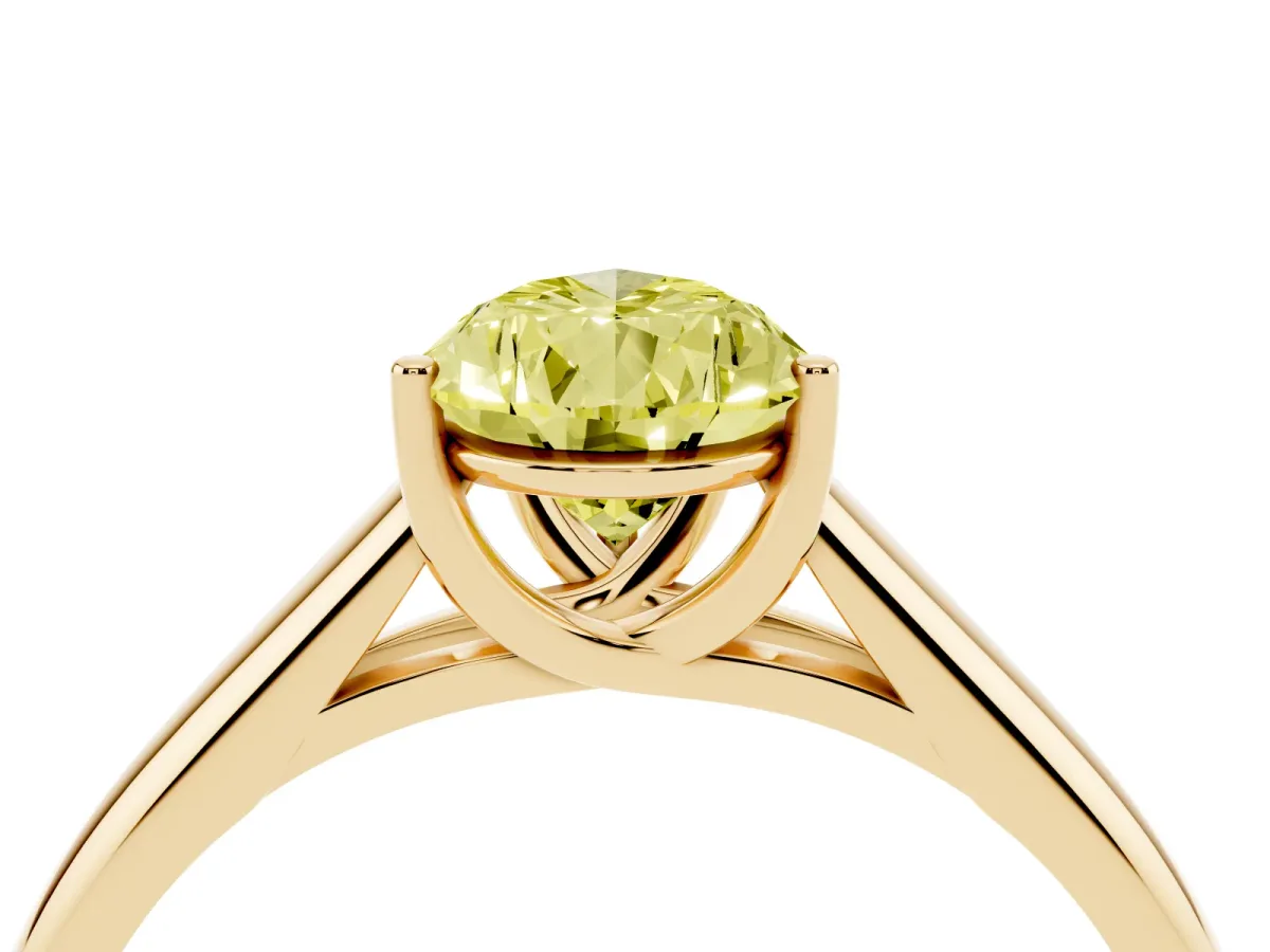 Fancy Yellow Pear Cut Solitaire Engagement Ring with Tapered Band and Four-Prong Setting Yellow gold
