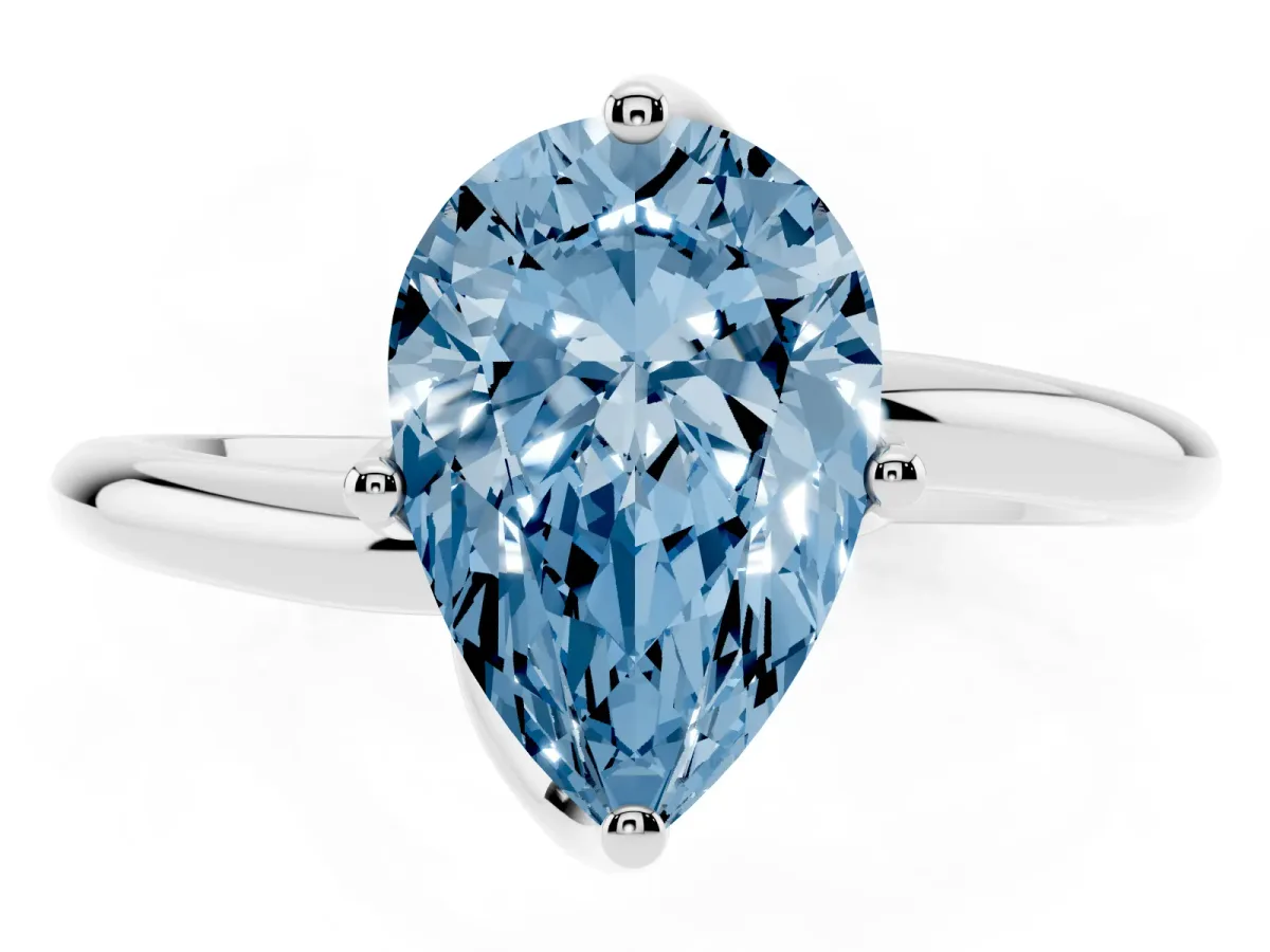 Fancy Blue Pear Cut Diamond Solitaire Engagement Ring with Four-Prong Setting and Classic Band Silver