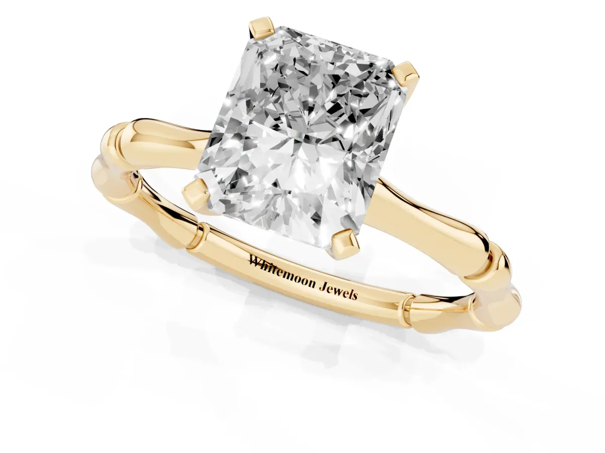 Radiant Cut Solitaire Diamond Ring with Bamboo Band and Four-Prong Setting Yellow gold