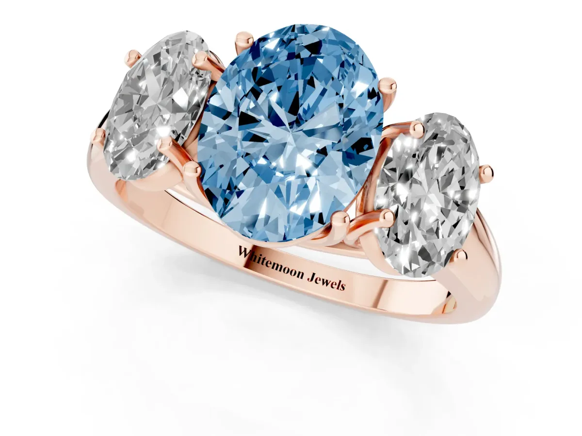 Fancy Blue Three-Stone Oval Cut Diamond Engagement Ring with Prong Setting Rose gold