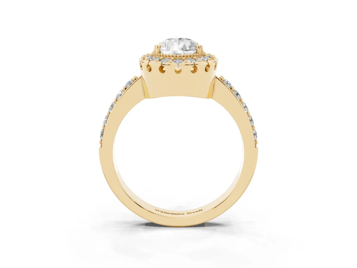 Pear Cut Diamond Halo Ring with Pavé Band and Prong Setting Yellow gold