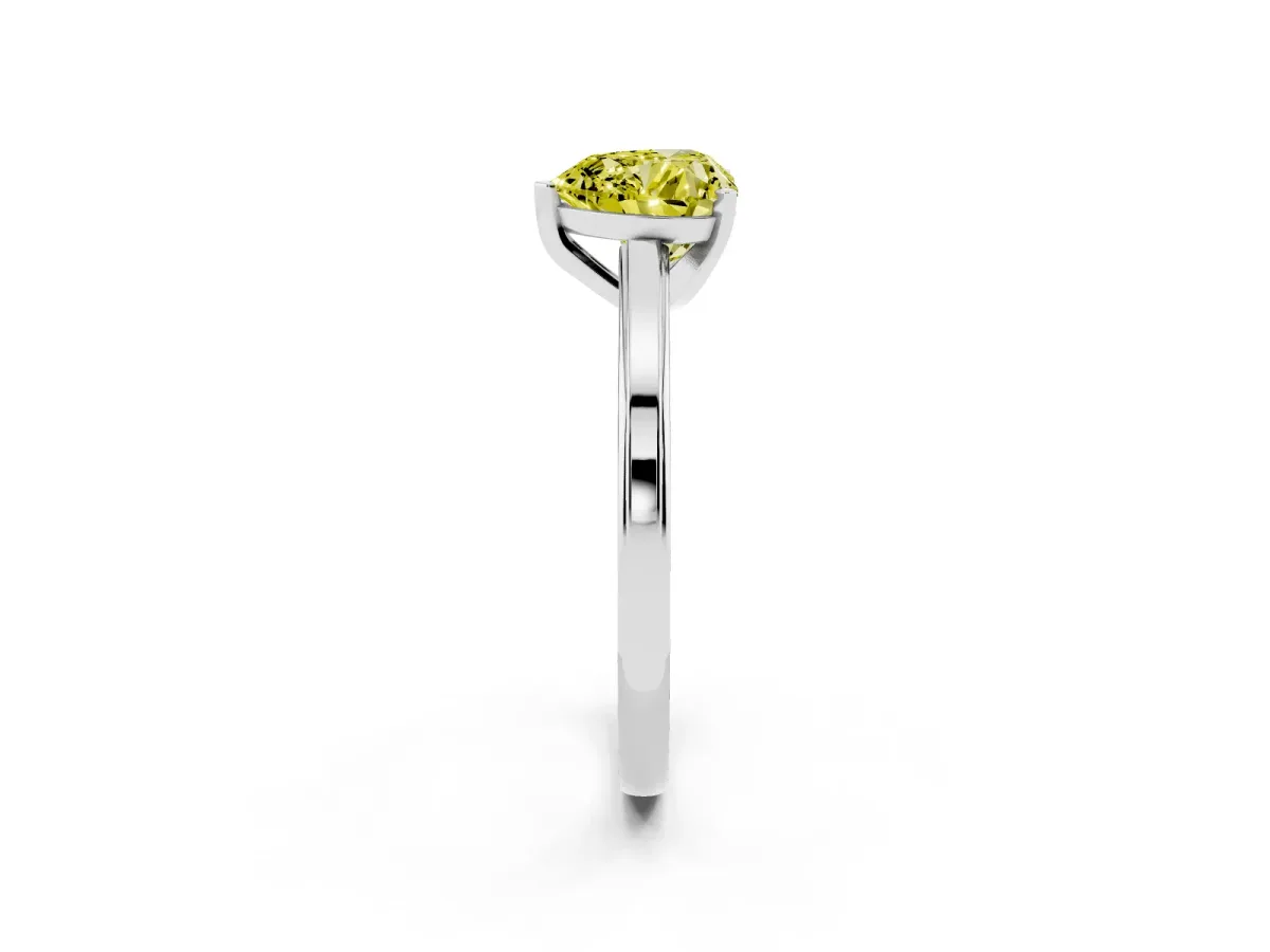 Fancy Yellow Heart Cut Solitaire Diamond Ring with Four-Prong Setting and Classic Band Silver