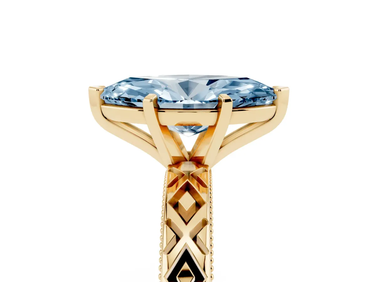 Fancy Blue Marquise Cut Solitaire Diamond Ring with Milgrain and Black Enamel X Pattern Band Yellow gold