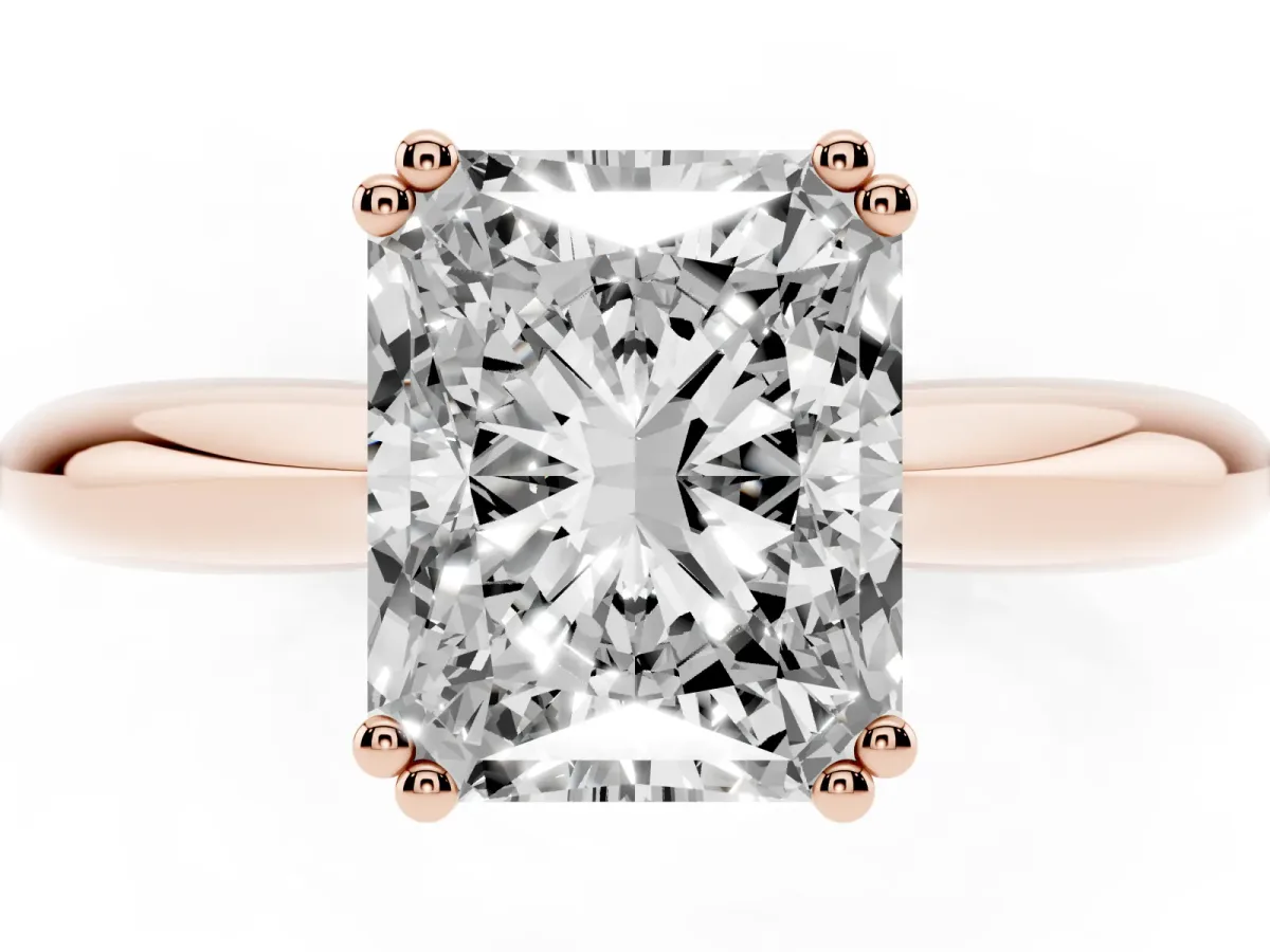 Radiant Cut Cut Solitaire Engagement Ring with Tapered Band and Four-Prong Setting Rose gold