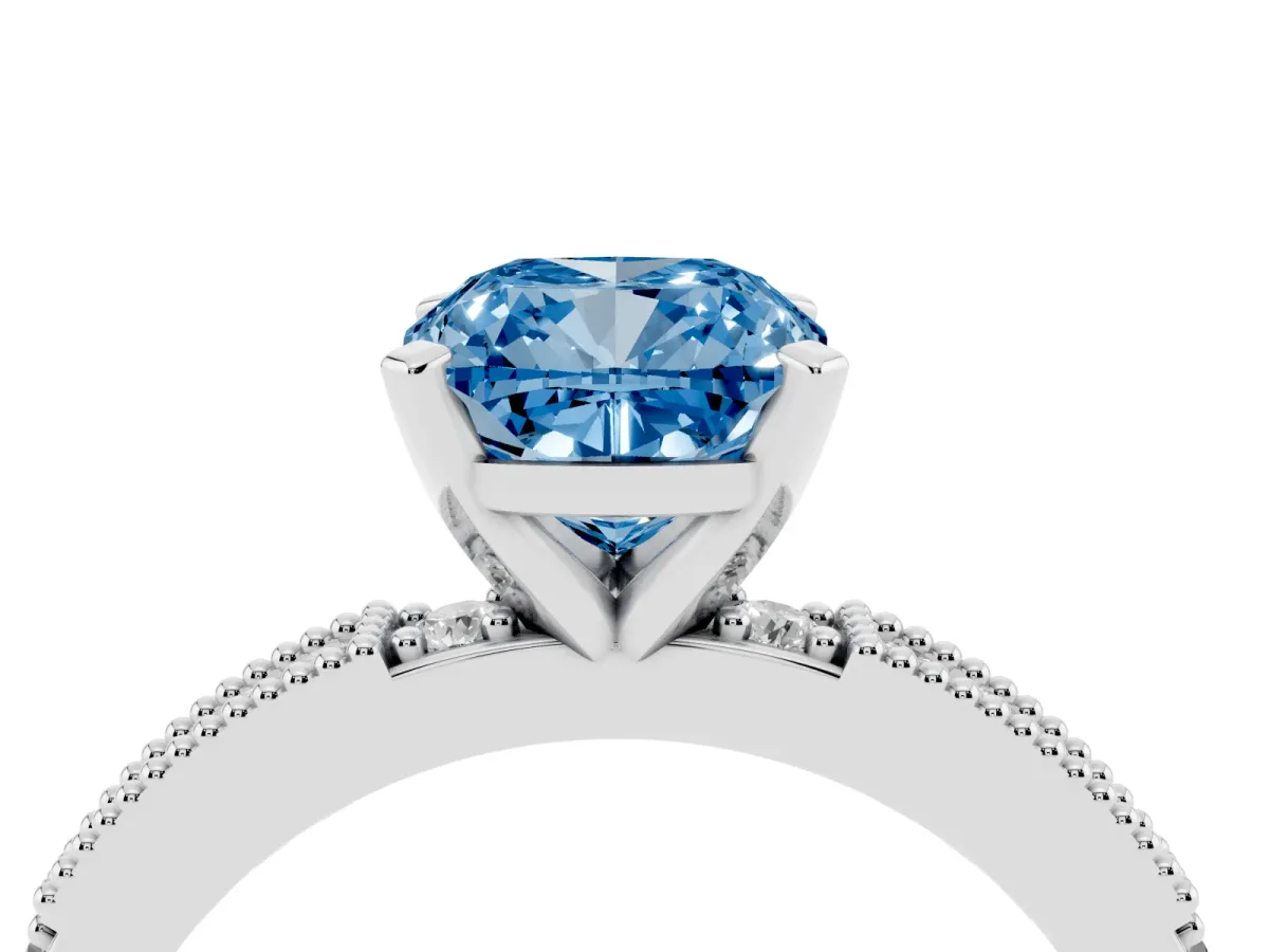 Fancy Blue Cushion Cut Solitaire with Pavé Band and Four-Prong Setting Silver