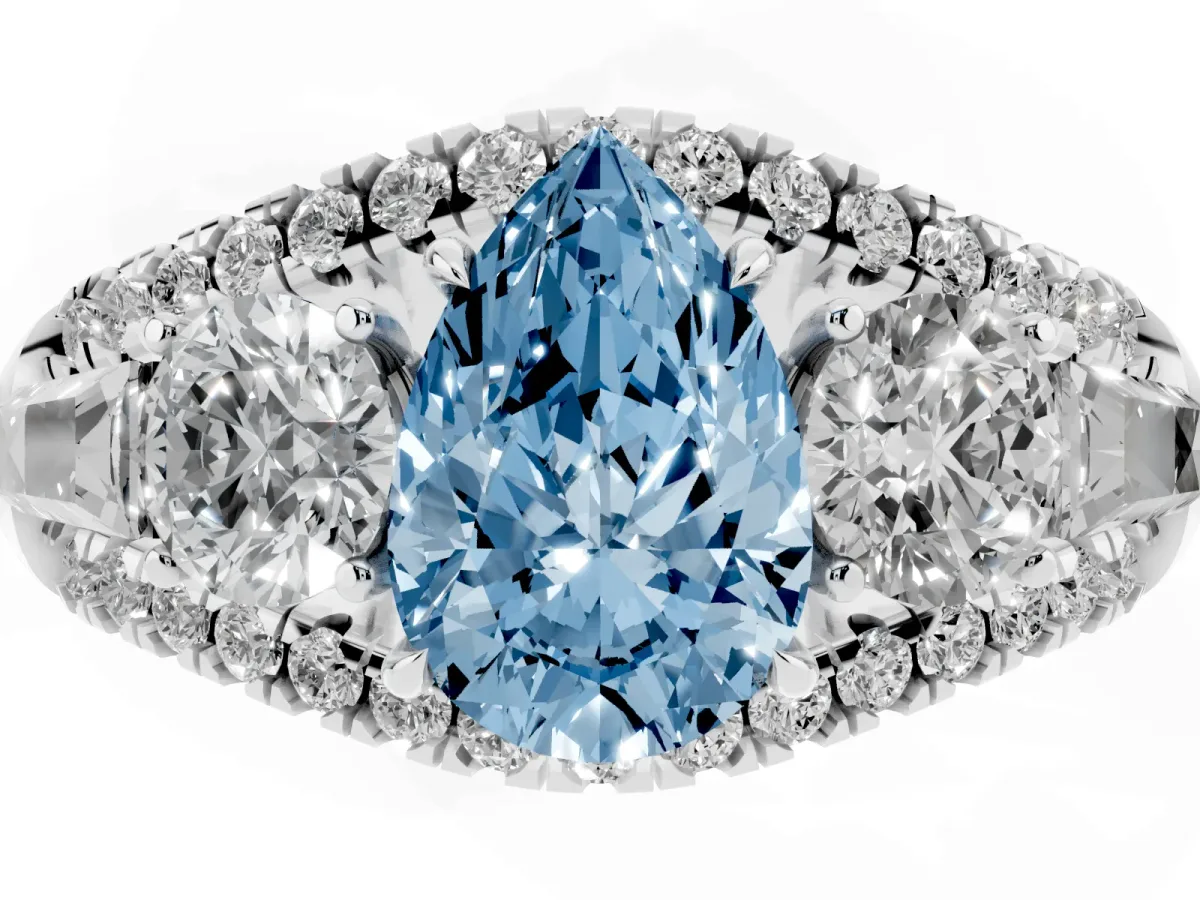 Fancy Blue Three-Stone Pear Cut Diamond Engagement Ring with Pave Band and Prong Setting Silver