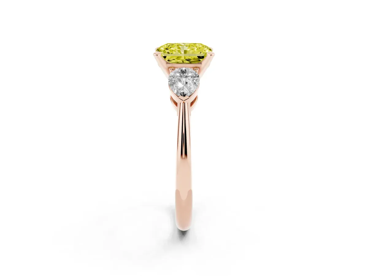 Fancy Yellow Three-Stone Radiant Cut Diamond Ring with Pear Side Stones and Four-Prong Setting Rose gold