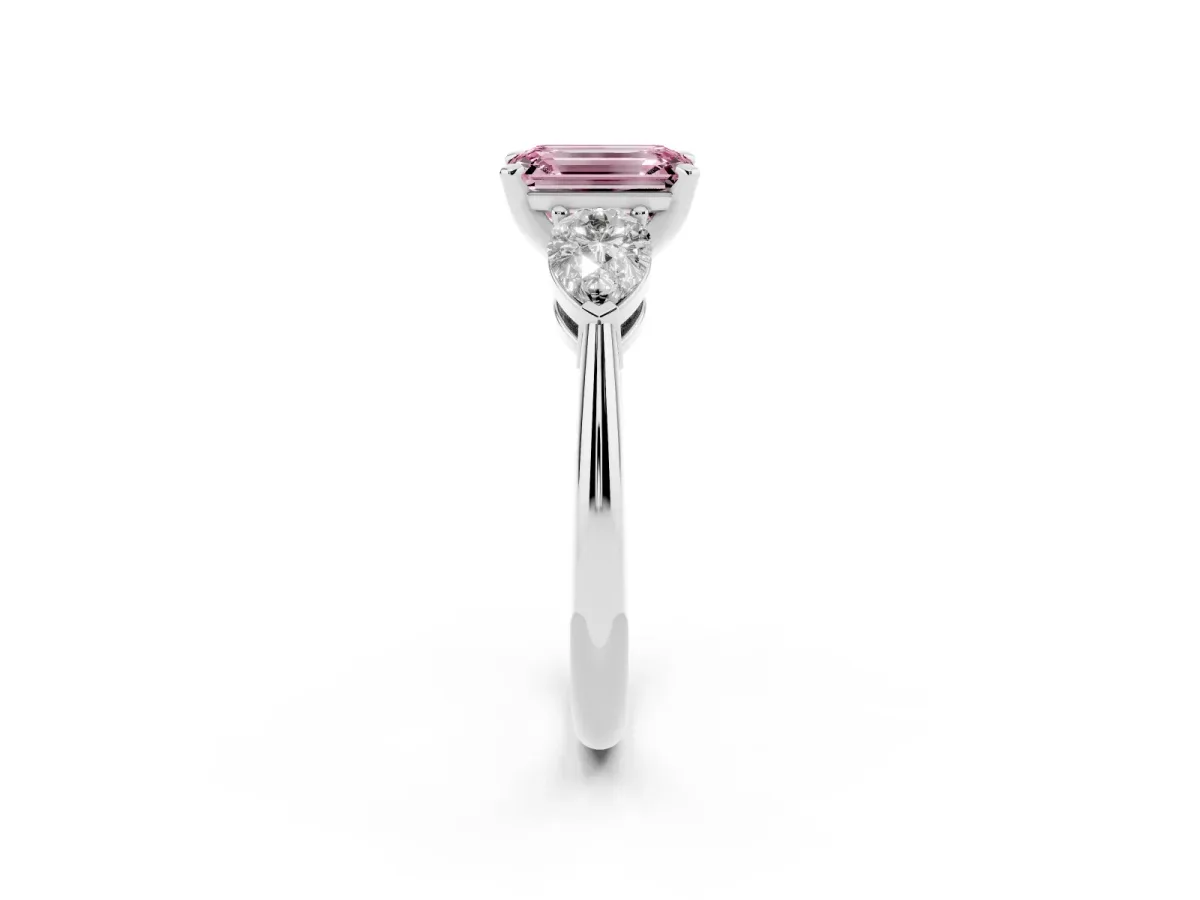Fancy Pink Three-Stone Emerald Cut Diamond Ring with Pear Side Stones and Four-Prong Setting Silver
