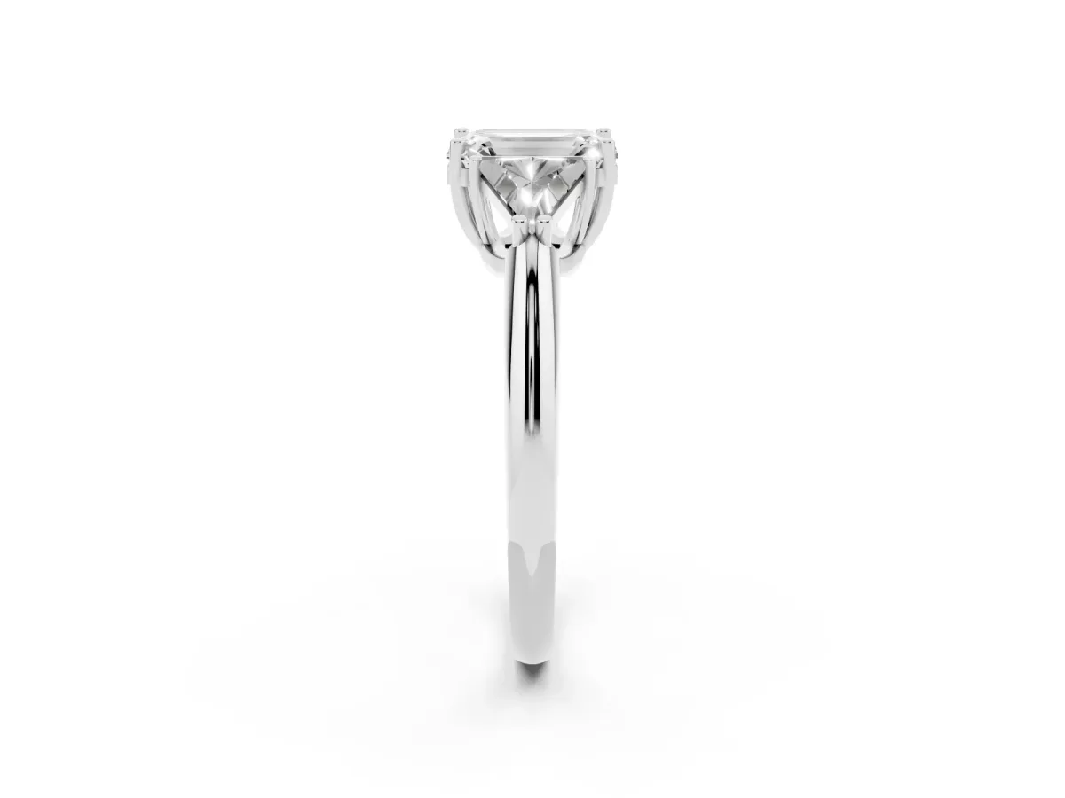 Three-Stone Emerald Cut Diamond Engagement Ring with Trillion Side Stones and Prong Setting Silver