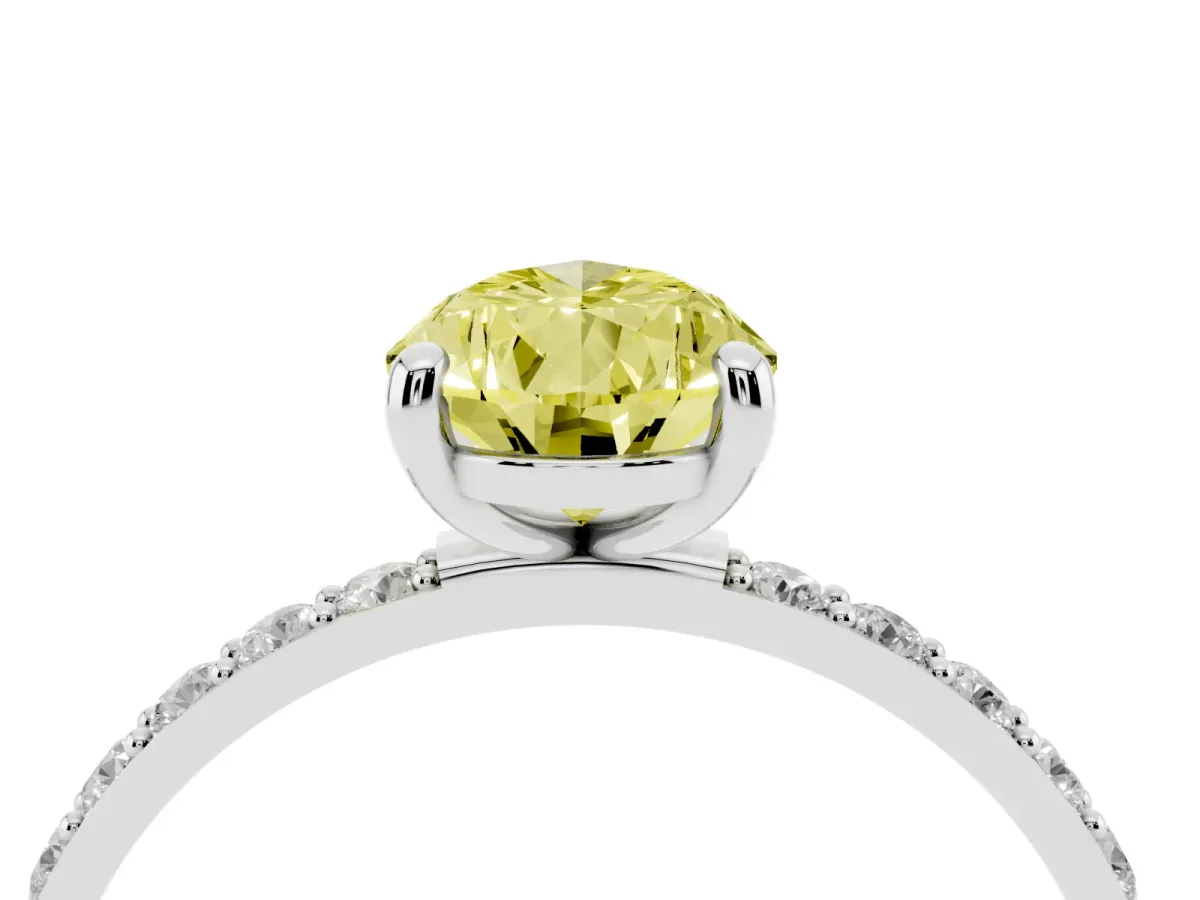 Fancy Yellow Pear Cut Diamond Solitaire Ring with Round Pavé Band and Prong Setting Silver