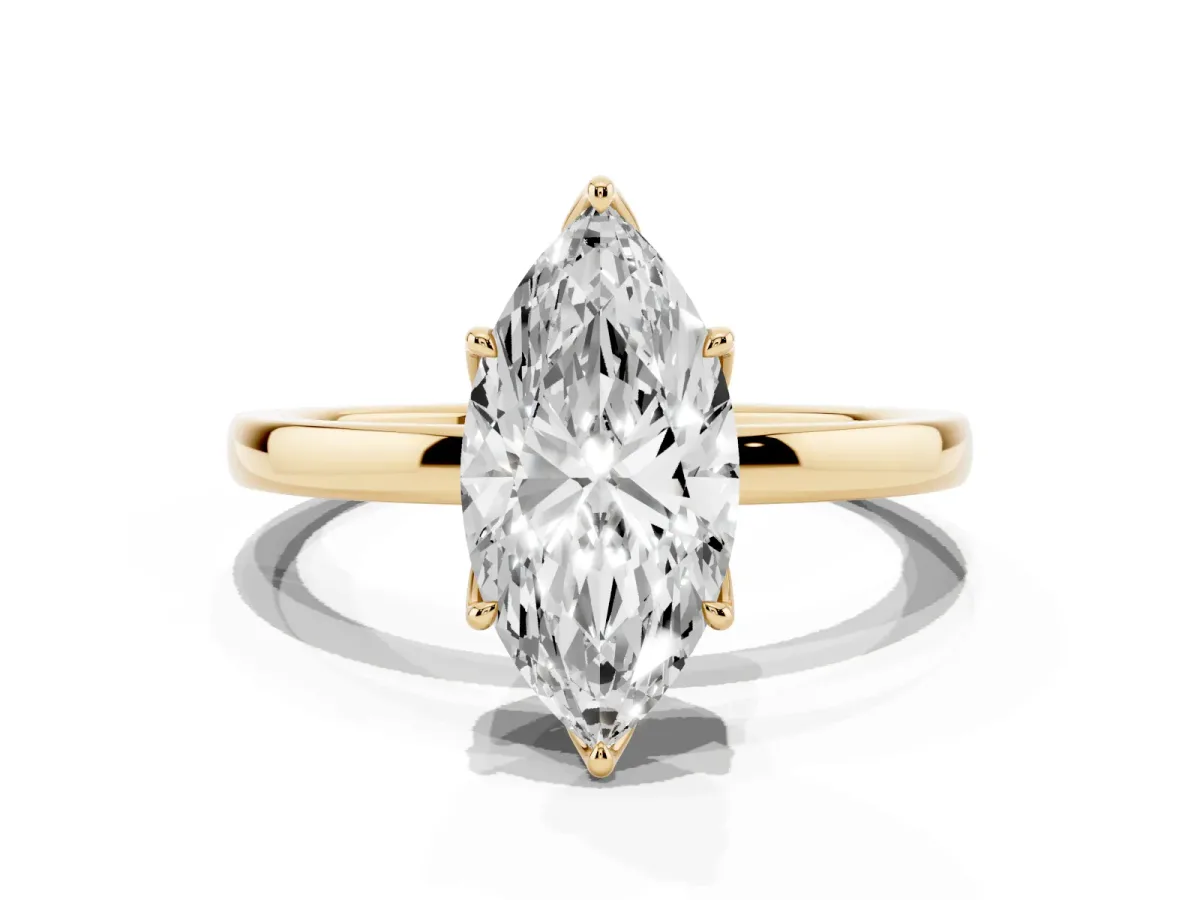 Marquise Cut Diamond Solitaire Ring with Thin Band and Prong Setting Yellow gold