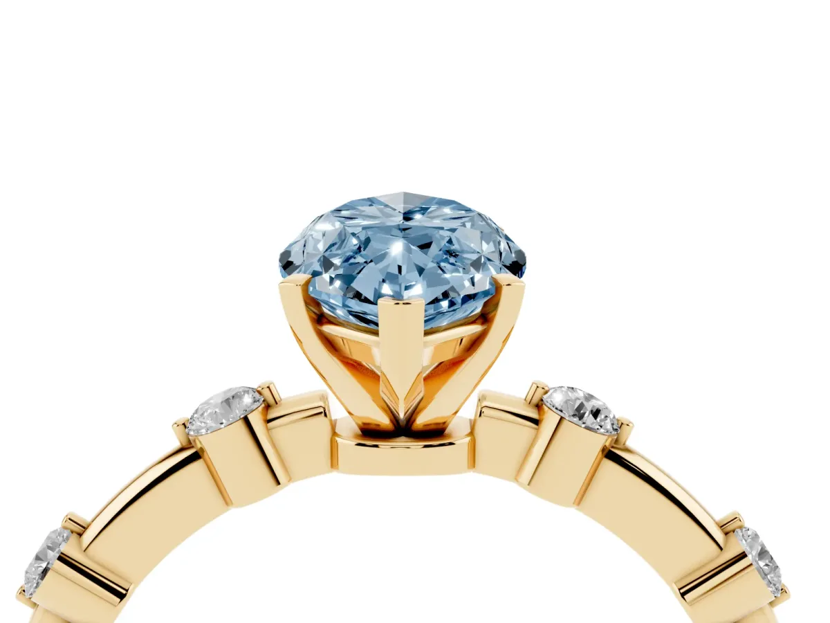 Fancy Blue Marquise Cut Solitaire Diamond Ring with Bezel Set Side Stones and Prong Setting Yellow gold