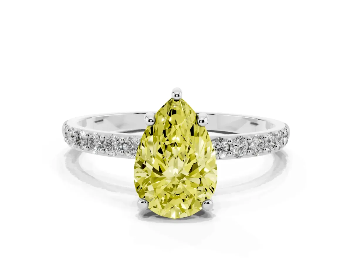 Fancy Yellow Pear Cut Diamond Solitaire Ring with Round Pavé Band and Prong Setting Silver