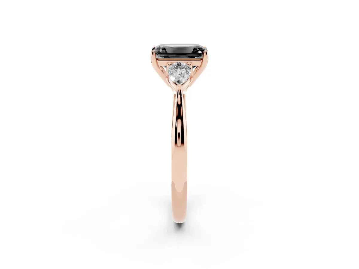 Fancy Black Emerald Cut Diamond Three-Stone Ring with Pear Side Stones and Prong Setting Rose gold