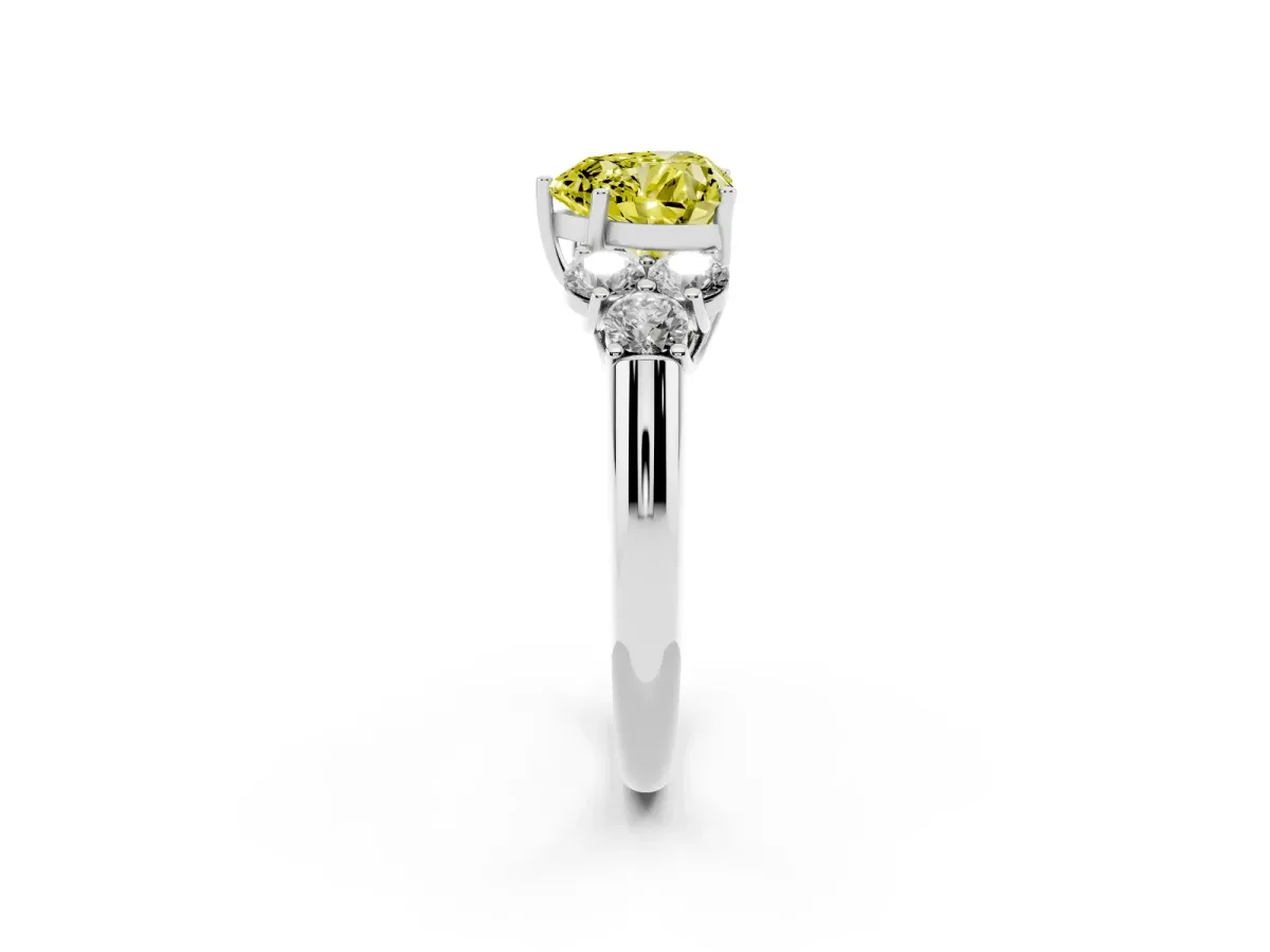 Fancy Yellow Heart Cut Cut Diamond Cluster Ring with Round Accent Stones and Prong Setting on a Classic Band White gold