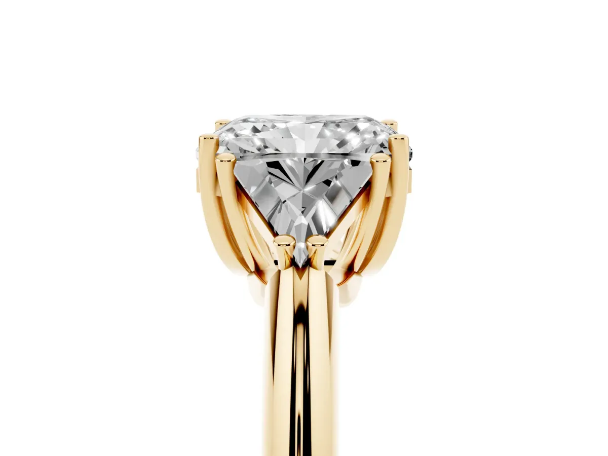 Three-Stone Radiant Cut Diamond Engagement Ring with Trillion Side Stones and Prong Setting Yellow gold