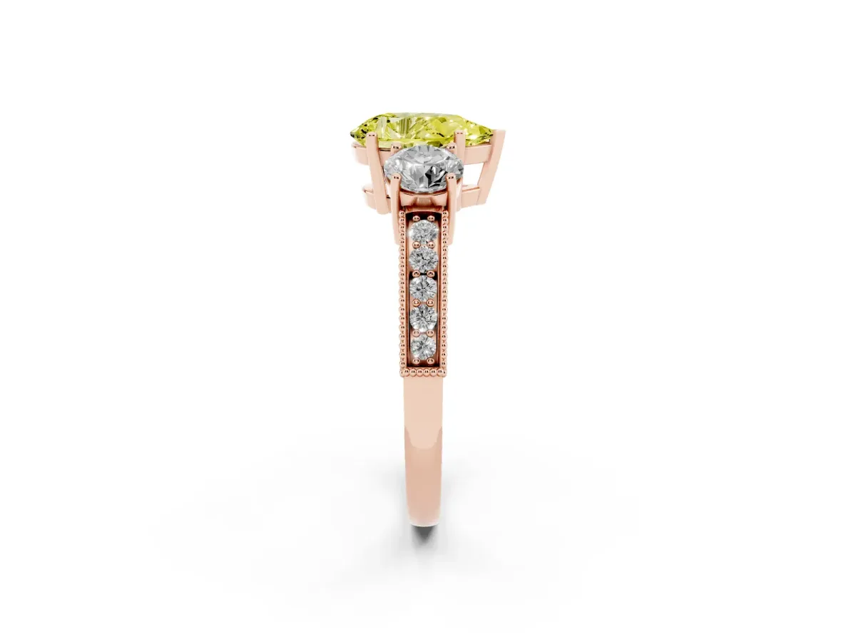 Fancy Yellow Pear Cut Three-Stone Diamond Ring with Pavé Band and Four-Prong Setting Rose gold