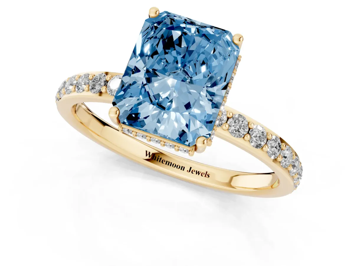 Fancy Blue Radiant Cut Diamond Solitaire Ring with Pavé Band and Hidden Halo Yellow gold