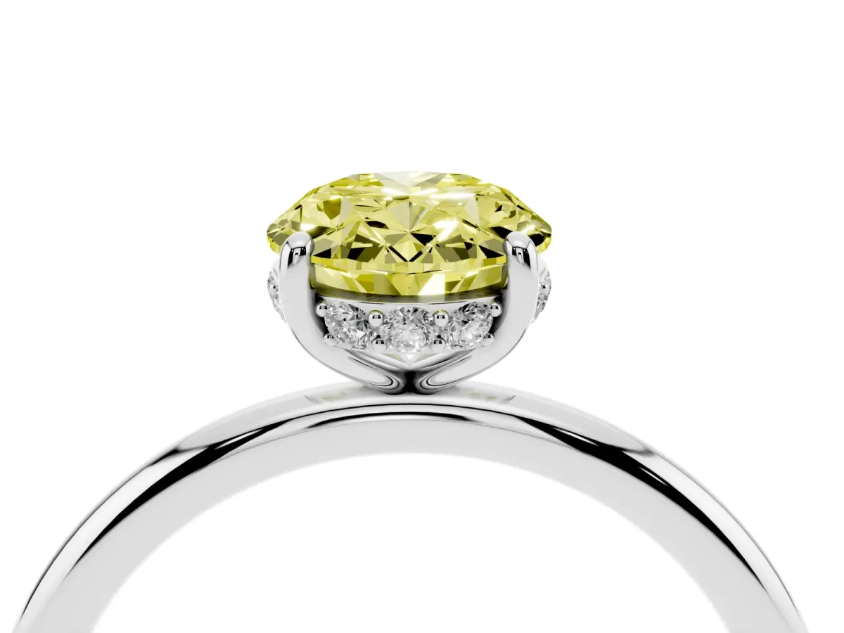 Fancy Yellow Oval Cut Solitaire Diamond Ring with a Classic Band and Four-Prong Setting Silver