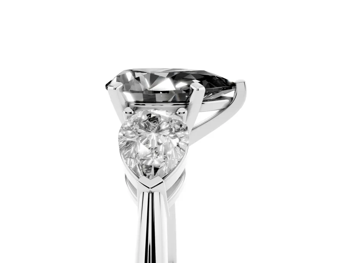 Fancy Black Three-Stone Pear Cut Diamond Ring with Pear Side Stones and Four-Prong Setting Platinum
