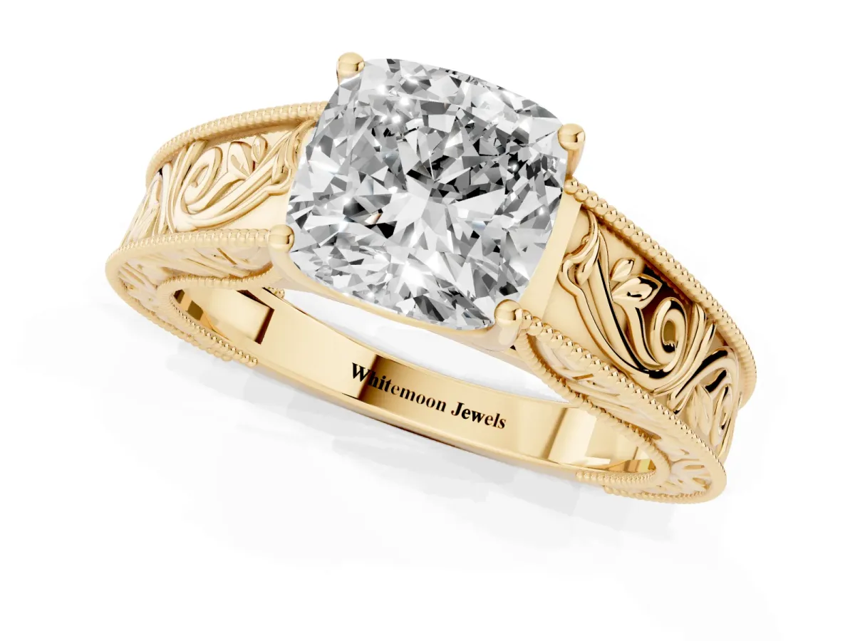 Cushion Cut Diamond Solitaire Ring with Engraved Band and Four-Prong Setting Yellow gold