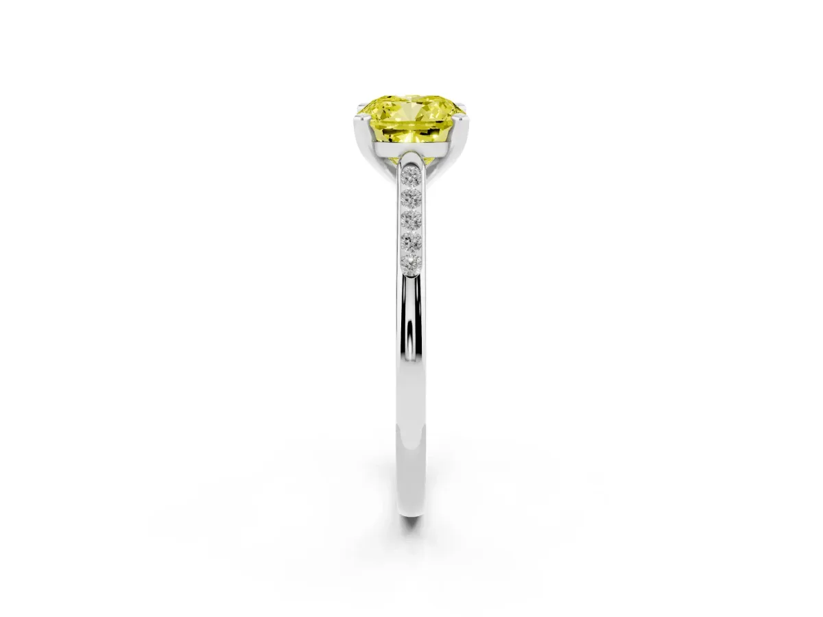 Fancy Yellow Cushion Cut Diamond Solitaire Ring with Channel Set Round Band and Prong Setting Silver