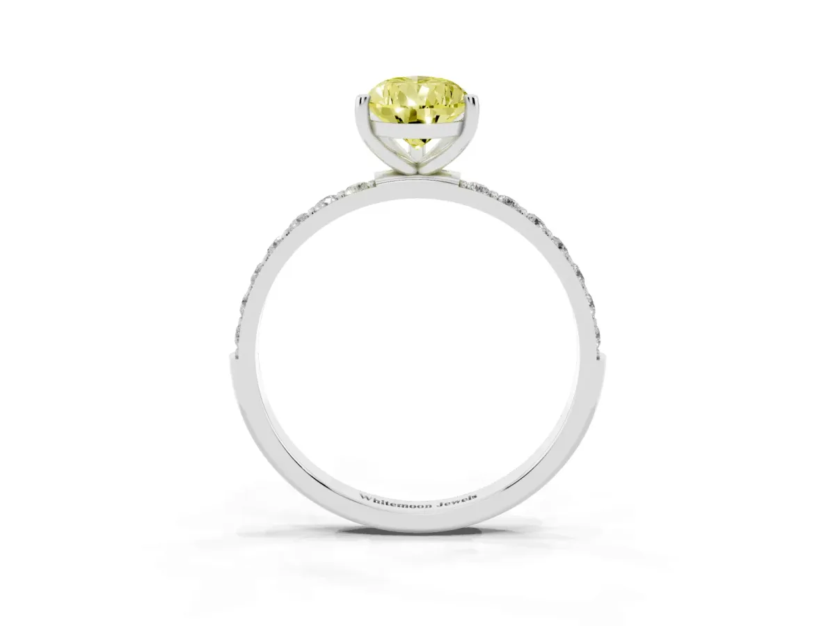 Fancy Yellow Pear Cut Diamond Solitaire Ring with Round Pavé Shoulders and Prong Setting Platinum