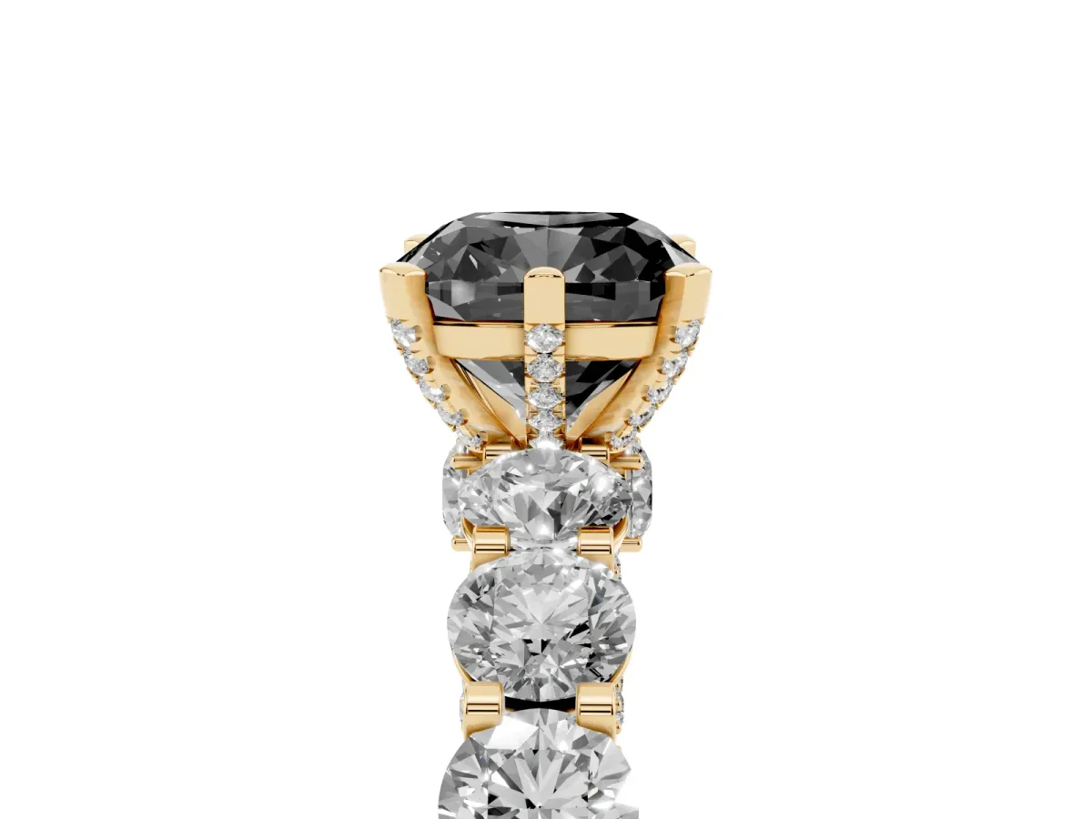 Fancy Black Cushion Cut Diamond Side Stone Engagement Ring with Four-Prong Setting Yellow gold