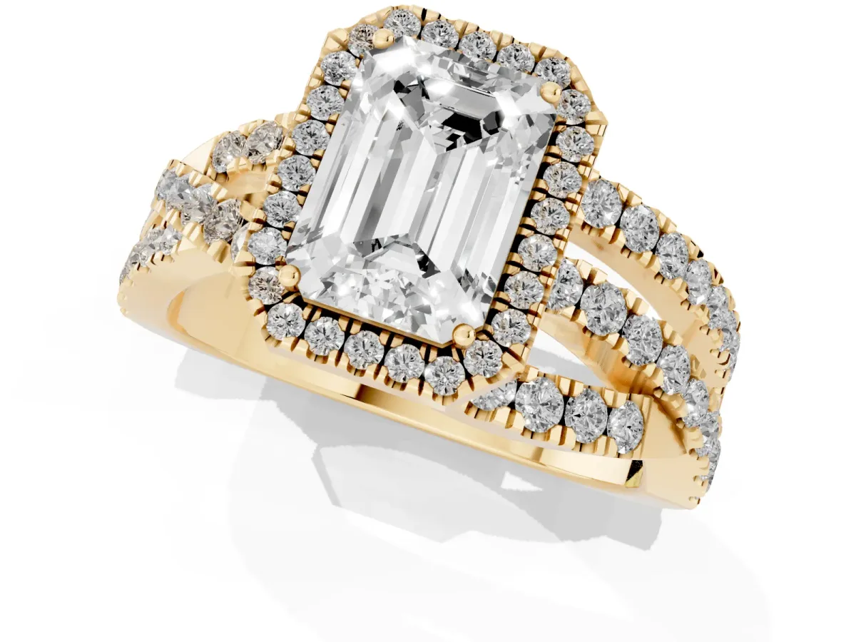 Emerald Cut Diamond Halo Ring with Round Split Shank and Prong Setting Yellow gold