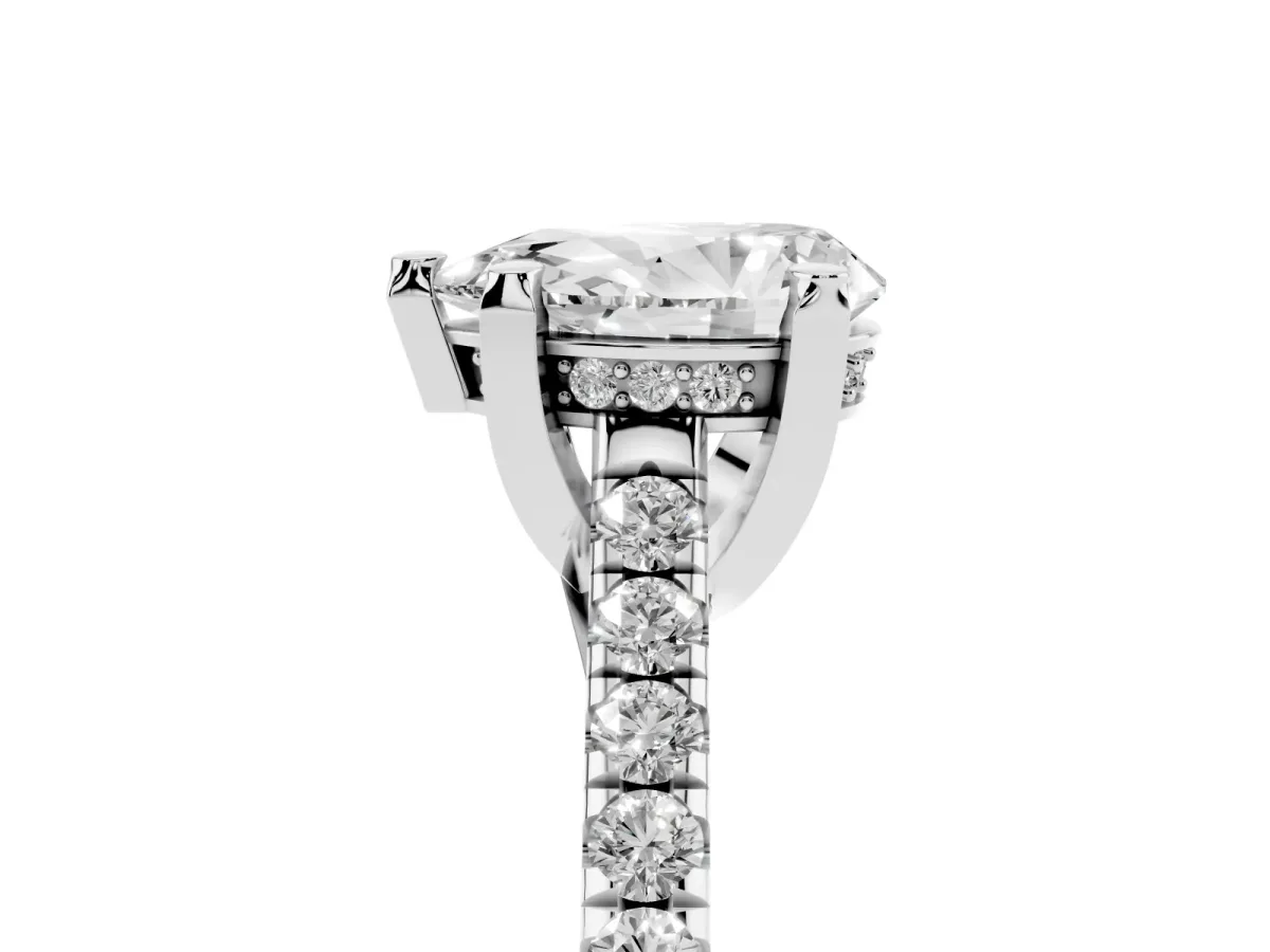 Pear Cut Brilliant Diamond Solitaire with Pavé Band and Four-Prong Setting Platinum