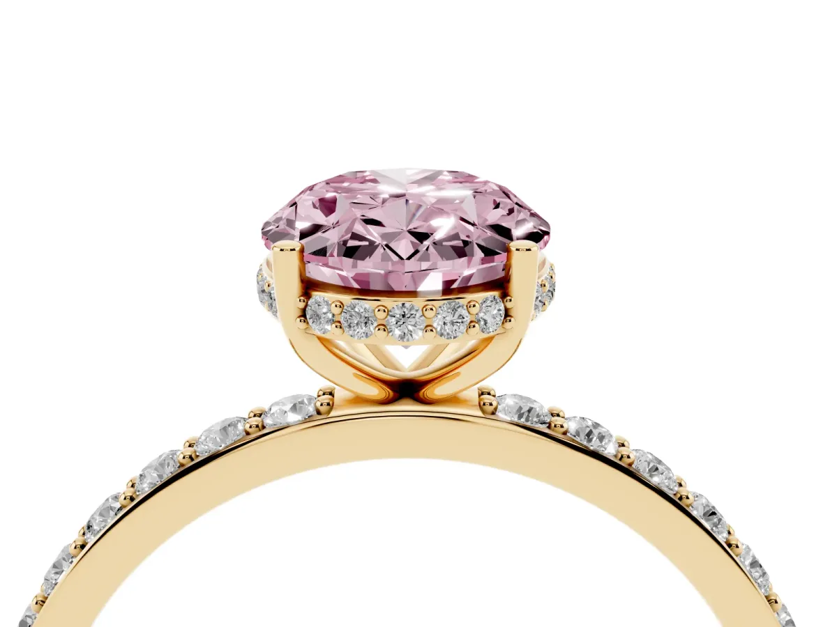 Fancy Pink Oval Cut Diamond Solitaire Ring with Pavé Band and Hidden Halo Yellow gold