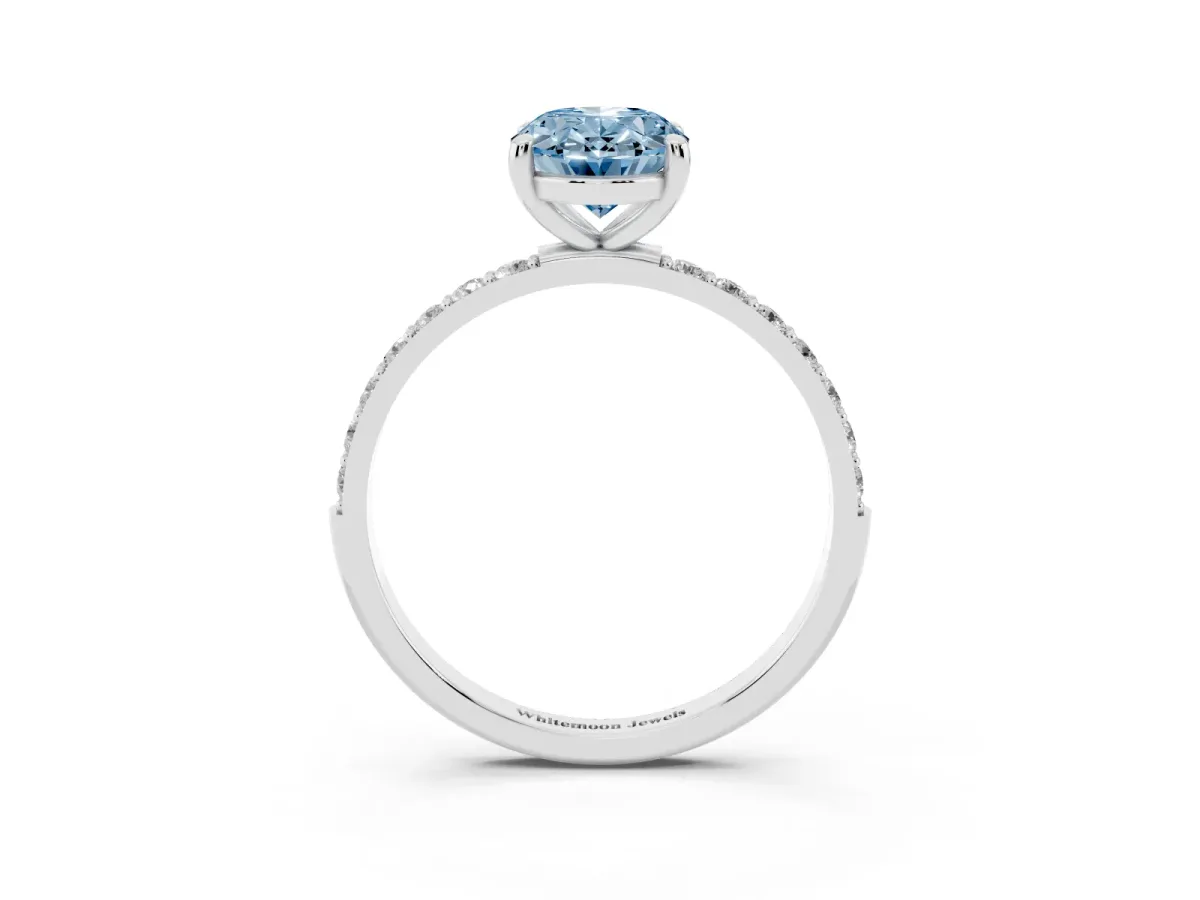 Fancy Blue Oval Cut Diamond Solitaire Ring with Round Pavé Band and Prong Setting Silver