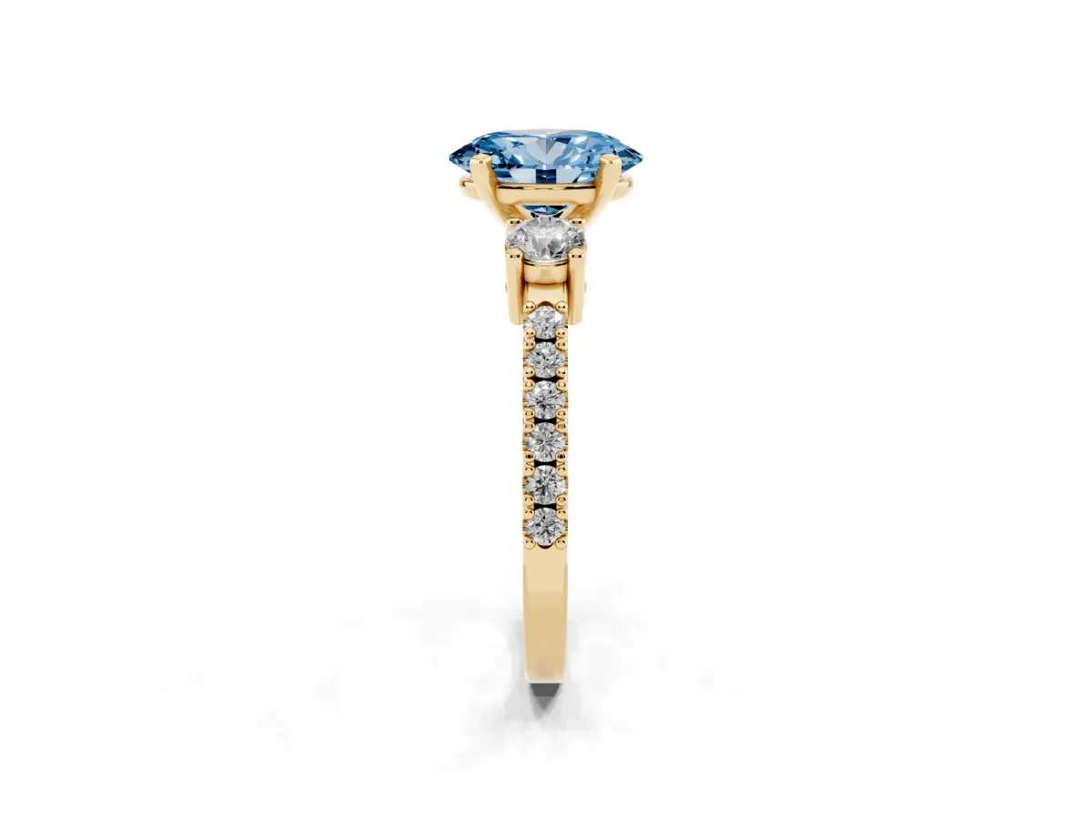 Fancy Blue Oval Cut Three-Stone Diamond Pavé Band with Prong Setting Yellow gold
