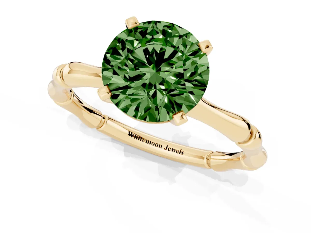 Fancy Green Round Cut Solitaire Diamond Ring with Bamboo Band and Four-Prong Setting Yellow gold