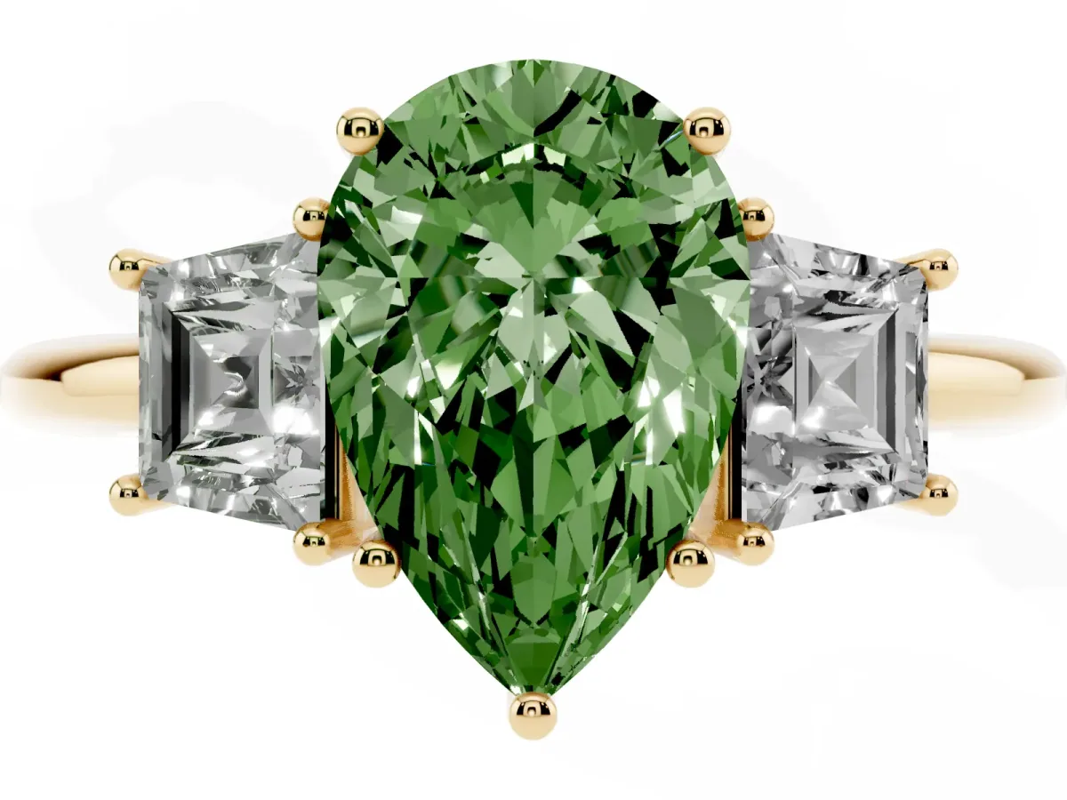 Fancy Green Pear Cut Diamond Three-Stone Ring with Trapezoid Side Stones and Prong Setting Yellow gold
