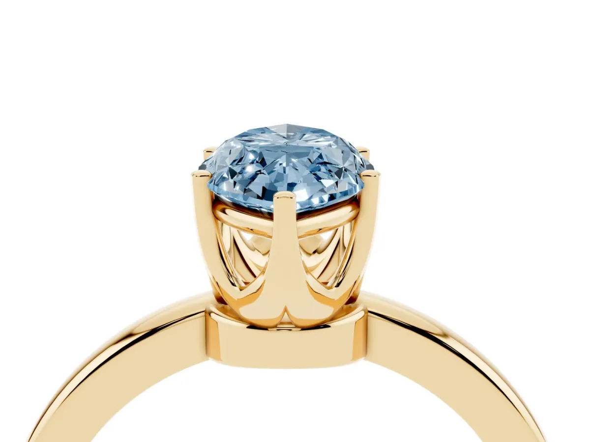 Fancy Blue Marquise Cut Solitaire Diamond Ring with Six-Prong Setting on a Classic Band Yellow gold