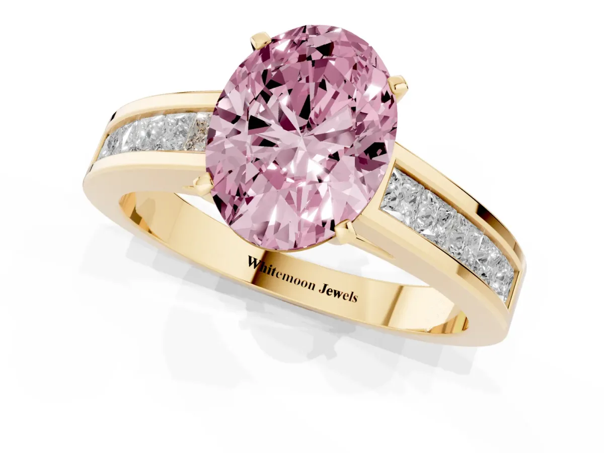 Fancy Pink Oval Cut Solitaire Diamond Ring with Channel-Set Band and Four-Prong Setting Yellow gold