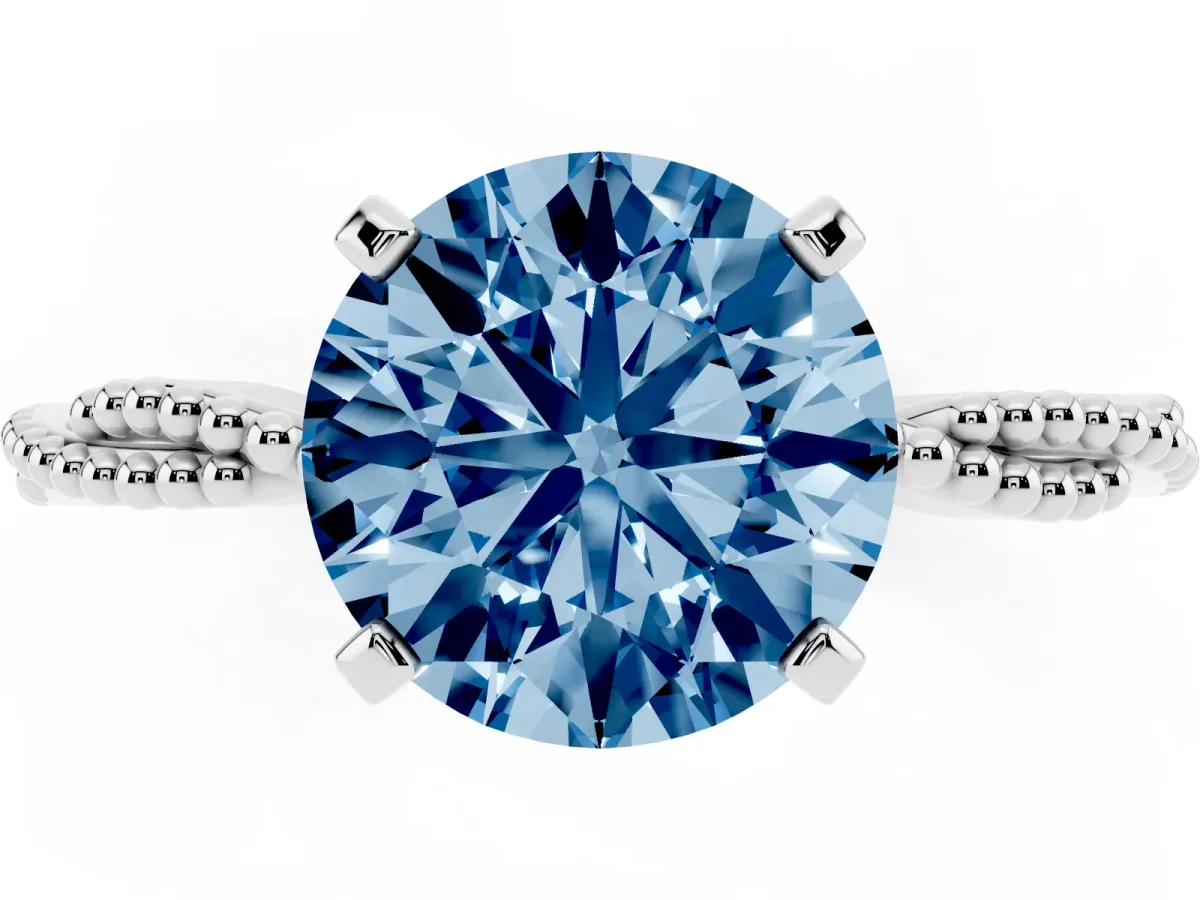 Fancy Blue Round Cut Solitaire Twisted Band with Bead Prong Setting Silver