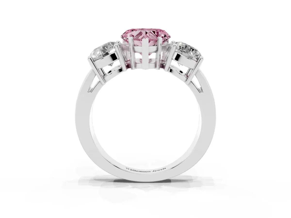 Fancy Pink Three-Stone Heart Cut Diamond Ring with Round Side Stones, Classic Band, and Four-Prong Setting Silver