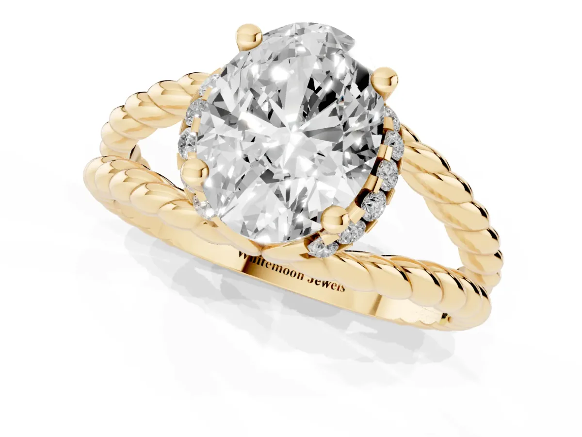 Oval Cut Halo Twisted Band Four-Prong Ring Yellow gold