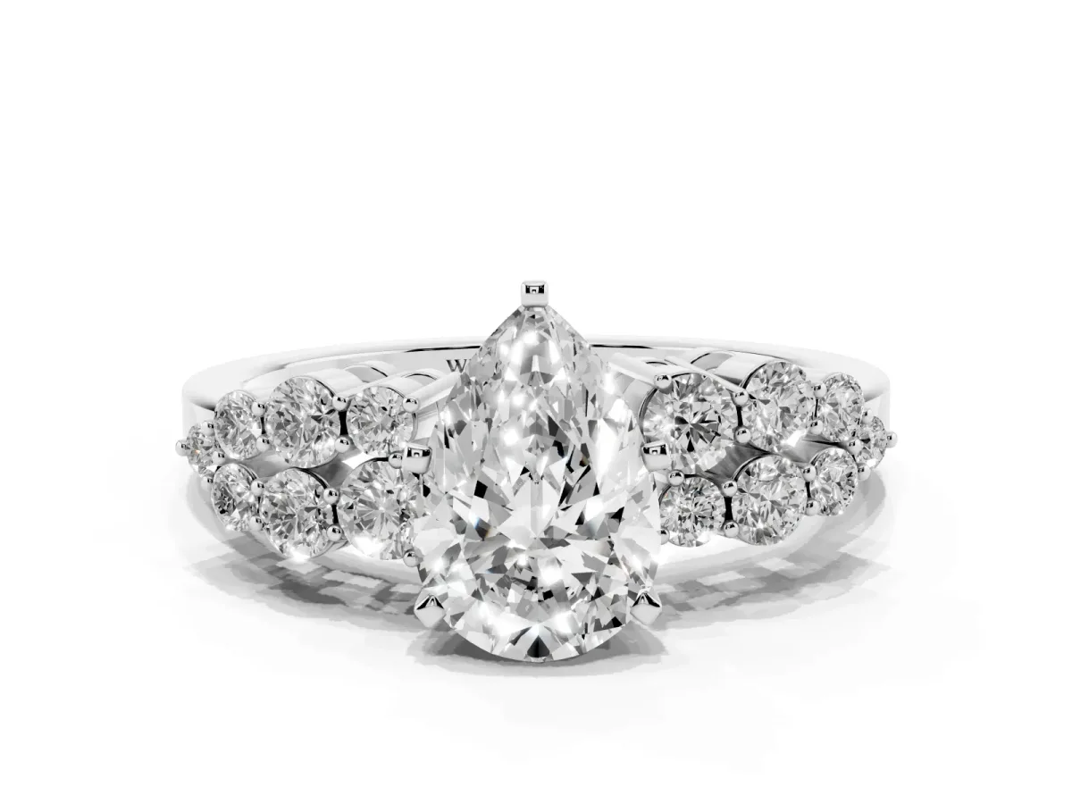 Pear Cut Cluster Diamond Engagement Ring with Pavé Band and Four-Prong Setting Silver