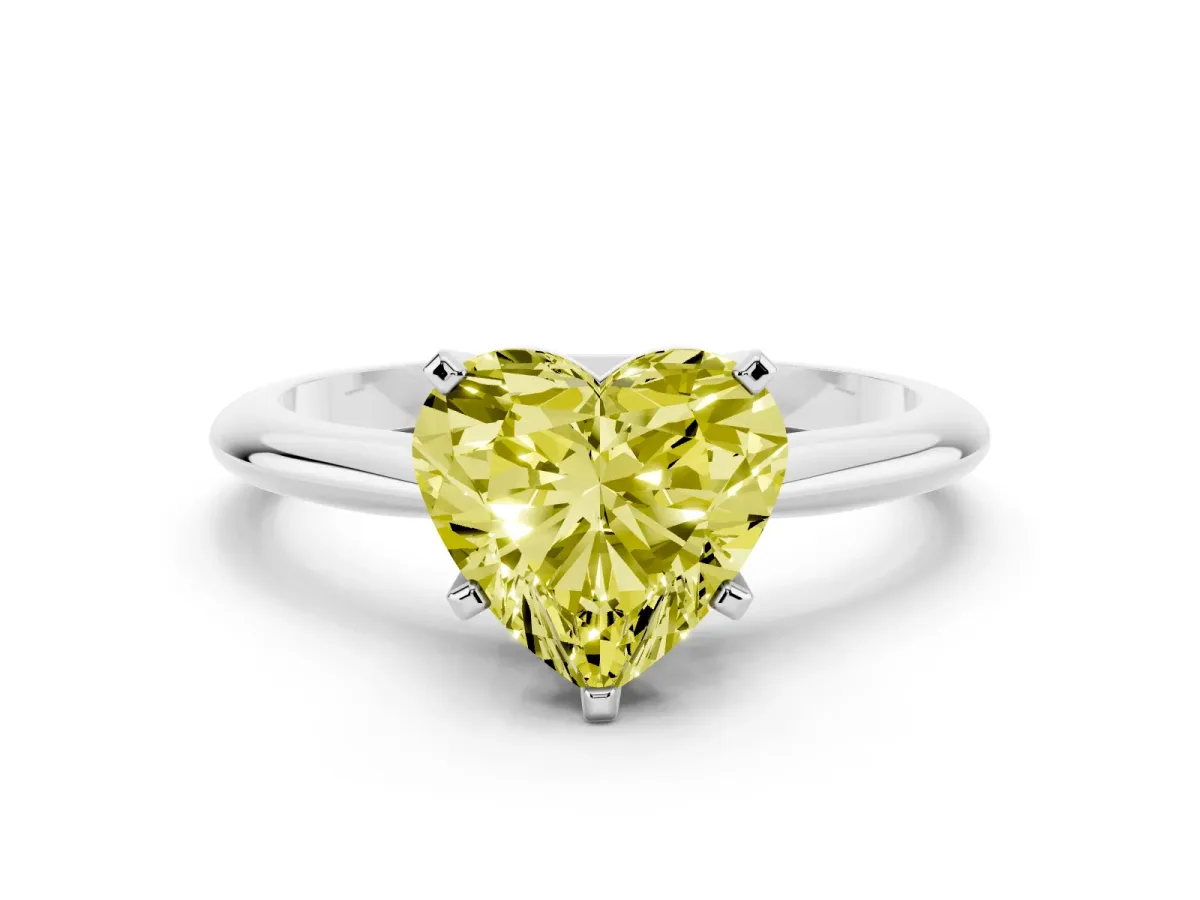 Fancy Yellow Heart Cut Cut Solitaire Ring with Four-Prong Setting on a Classic Band Silver