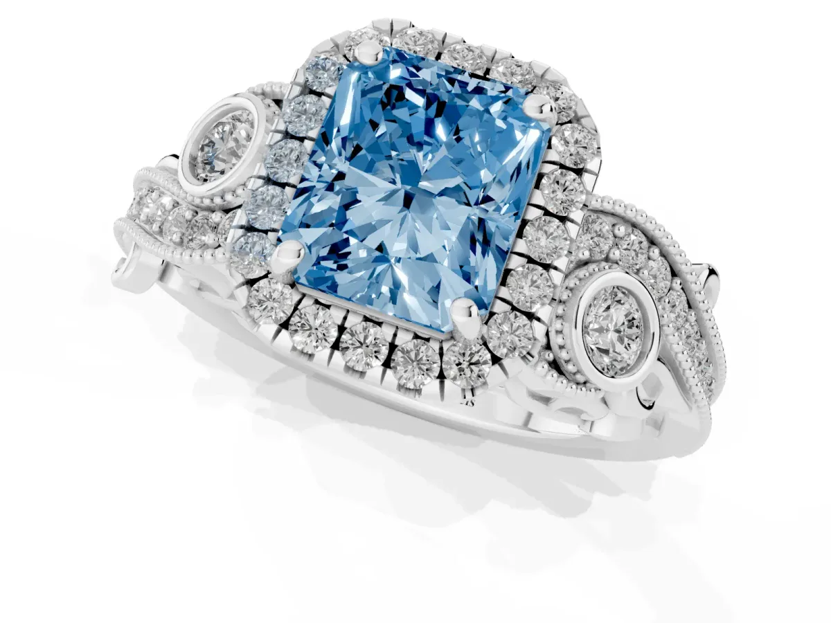 Fancy Blue Radiant Cut Diamond Halo Ring with Milgrain Pavé Band and Four-Prong Setting Silver
