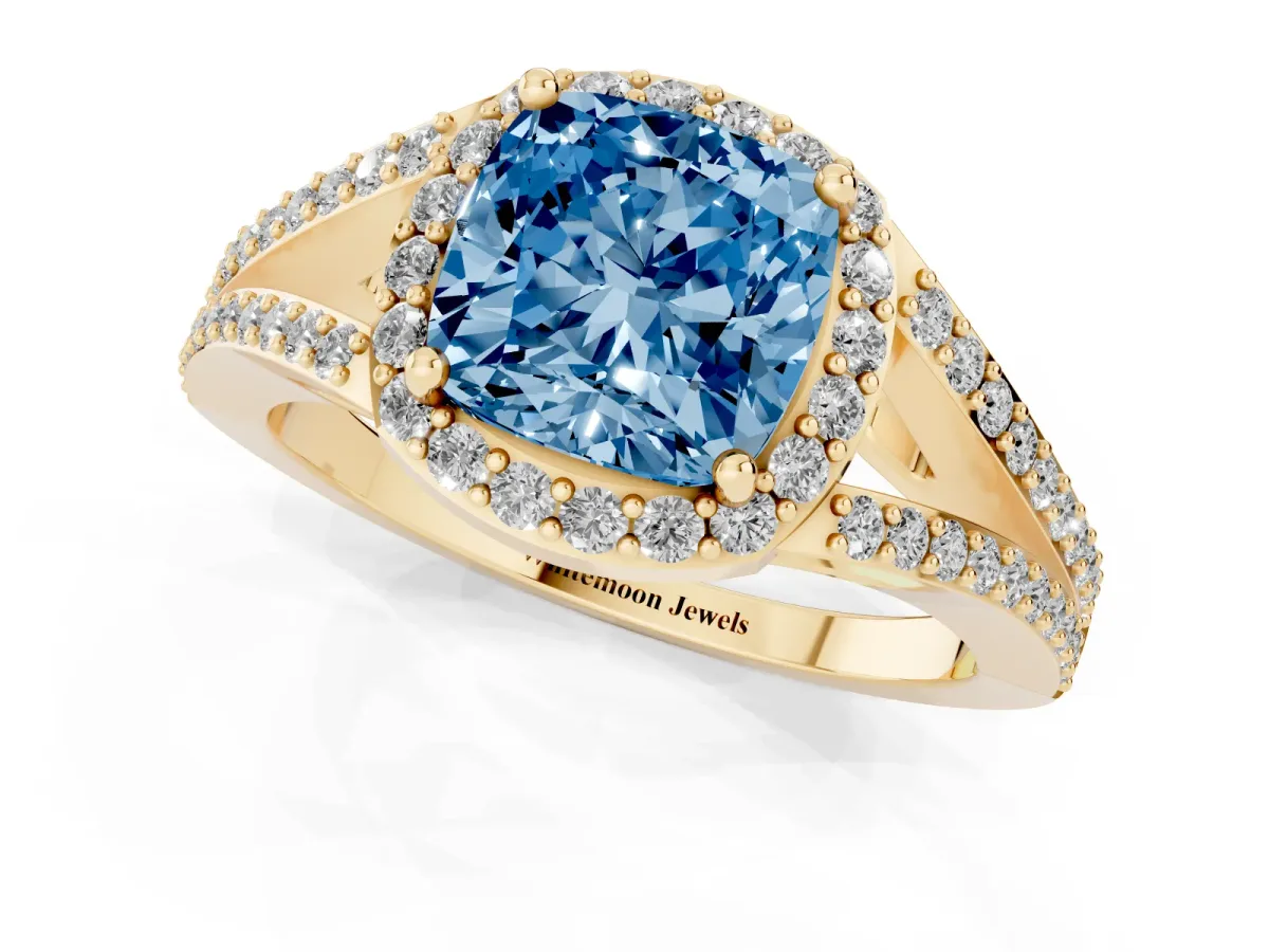 Fancy Blue Cushion Cut Halo Split Shank Diamond Ring with Prong Setting Yellow gold