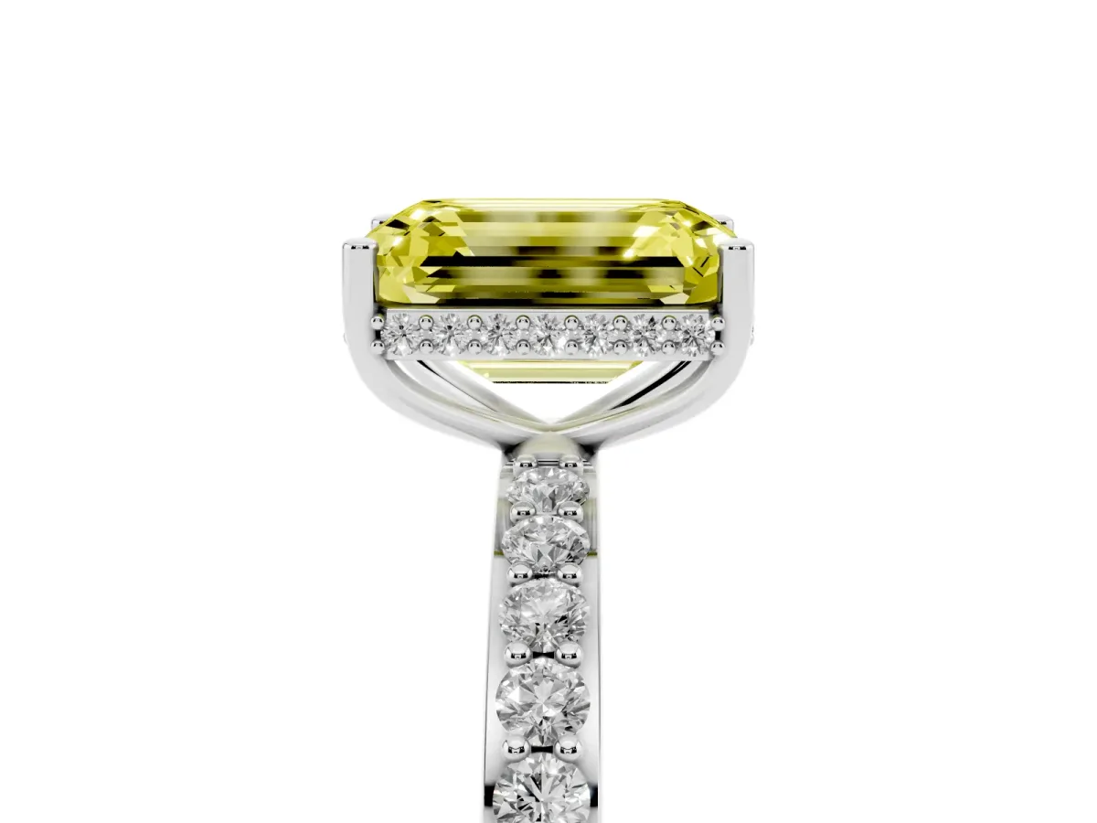 Fancy Yellow Emerald Cut Diamond Solitaire Ring with Pavé Band and Hidden Halo White gold