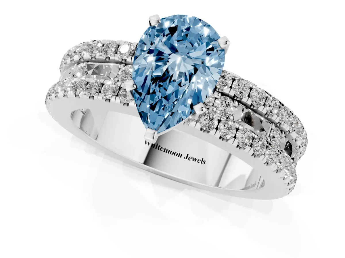 Fancy Blue Pear Cut Diamond Solitaire Ring with Pavé and Channel Set Band Silver