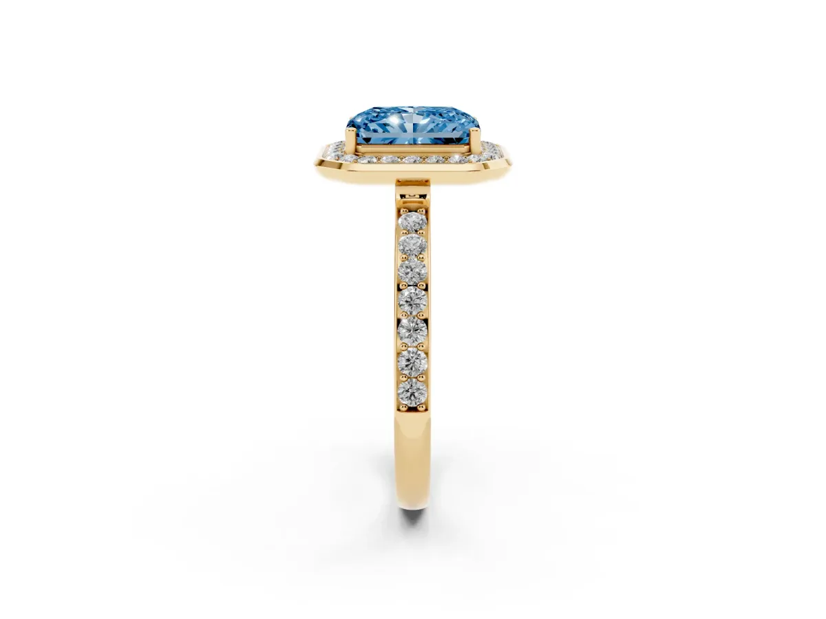 Fancy Blue Radiant Cut Diamond Halo Ring with Bezel Frame and Pavé Band Yellow gold