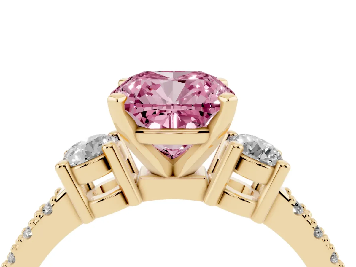 Fancy Pink Cushion Cut Three-Stone Diamond Pavé Band with Prong Setting Yellow gold