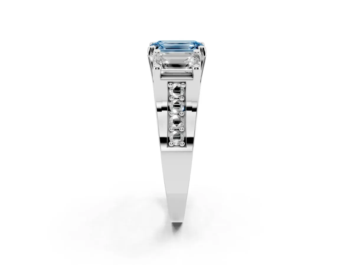 Fancy Blue Emerald Cut Diamond Three-Stone Ring with Channel Set Band and Four-Prong Setting Silver