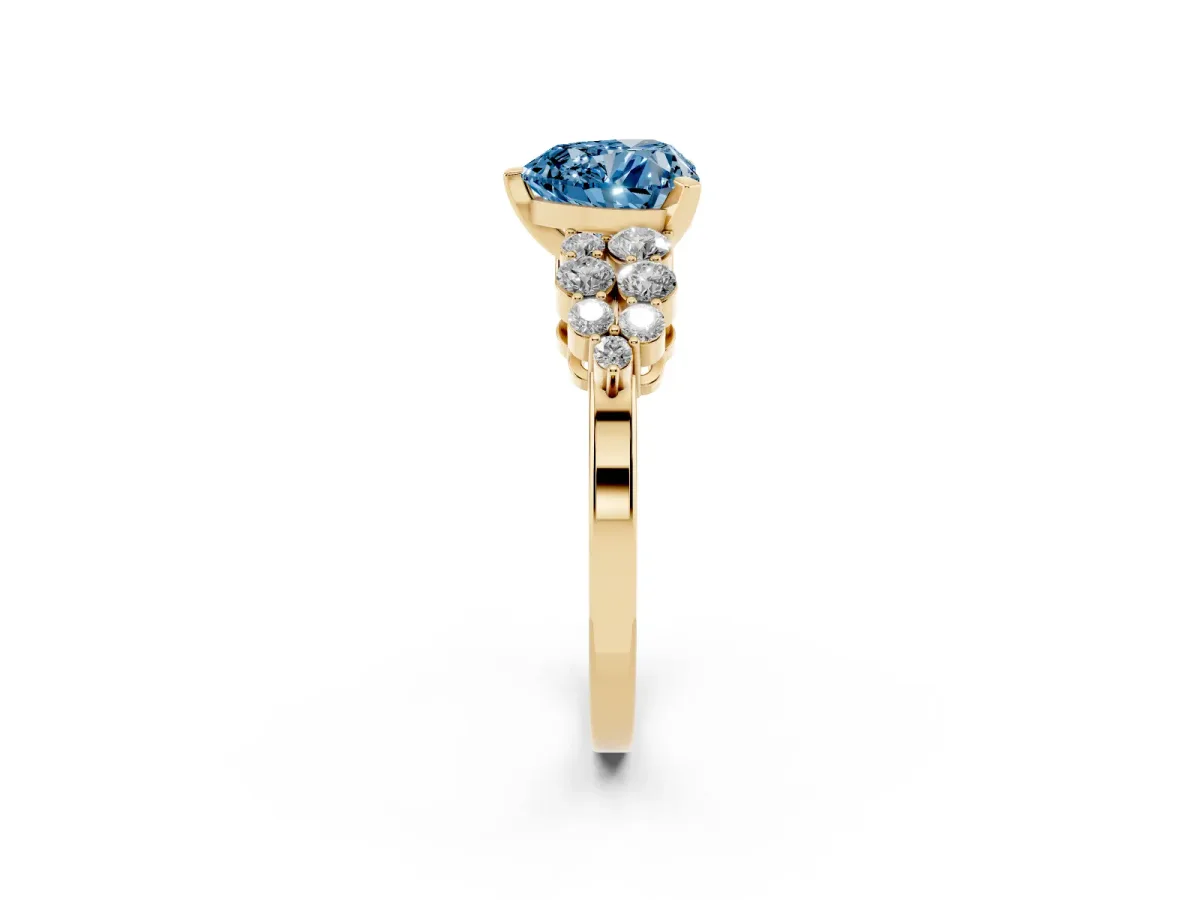Fancy Blue Heart Cut Cluster Diamond Engagement Ring with Pavé Band and Four-Prong Setting Yellow gold